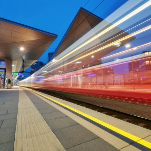 High,Speed,Train,In,Motion,On,The,Railway,Station,At High,Speed,Train,In,Motion,On,The,Railway,Station,At
